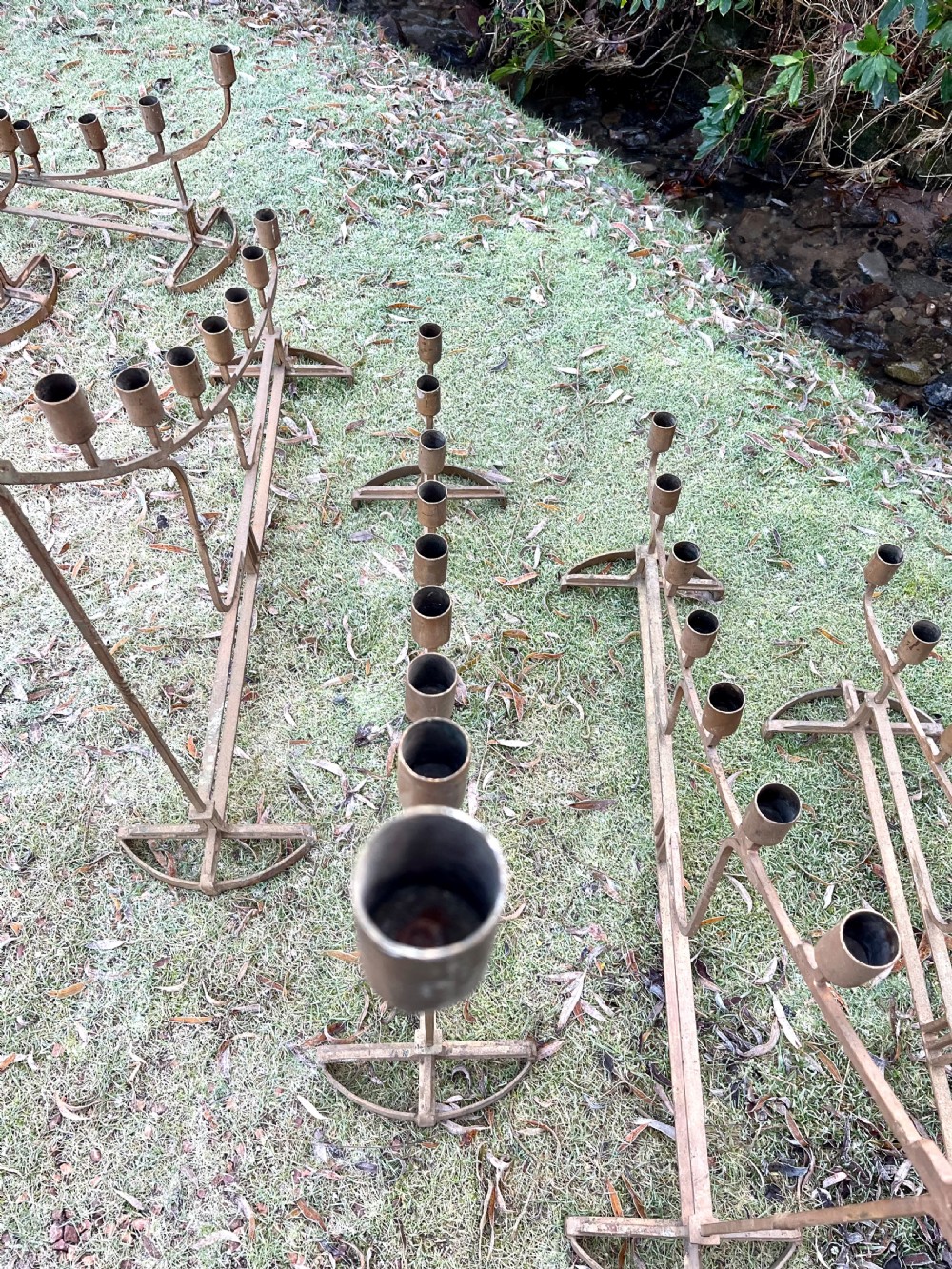 Eight large steel candlesticks  View XVII