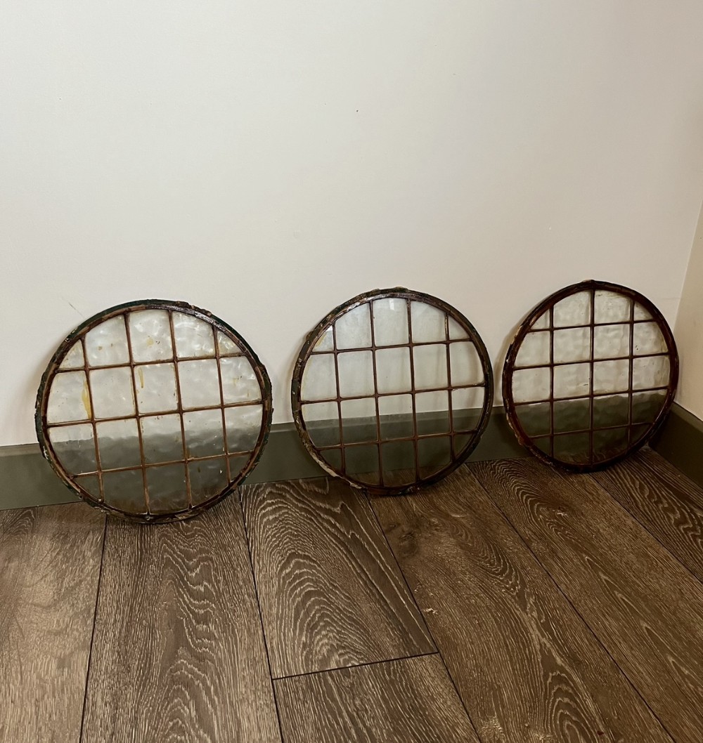 Three copper framed windows 