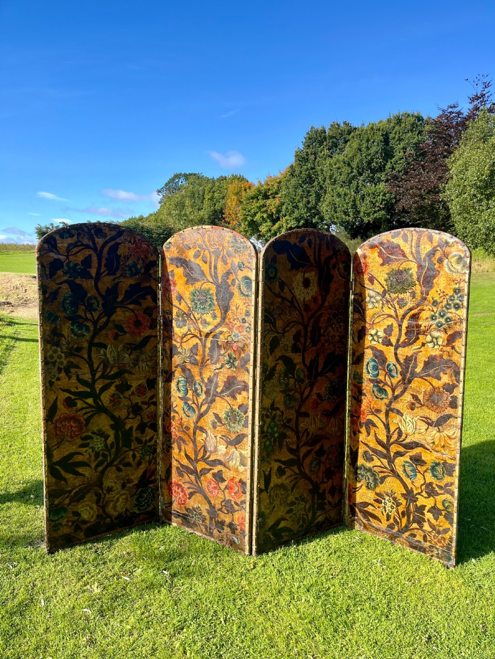 Painted leather four fold screen 