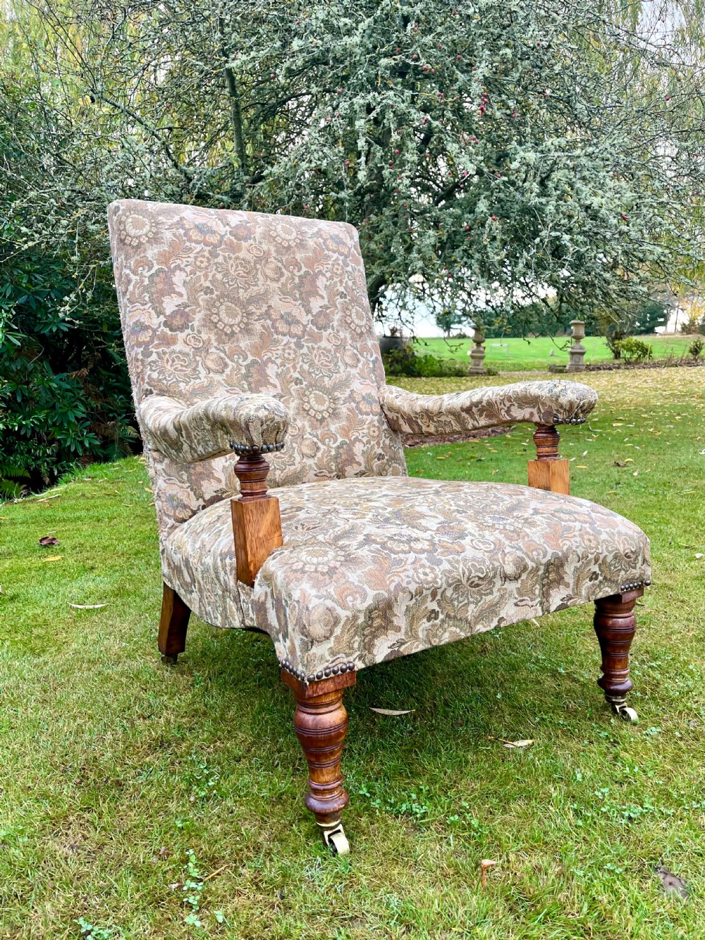Oak upholstered open armchair 
