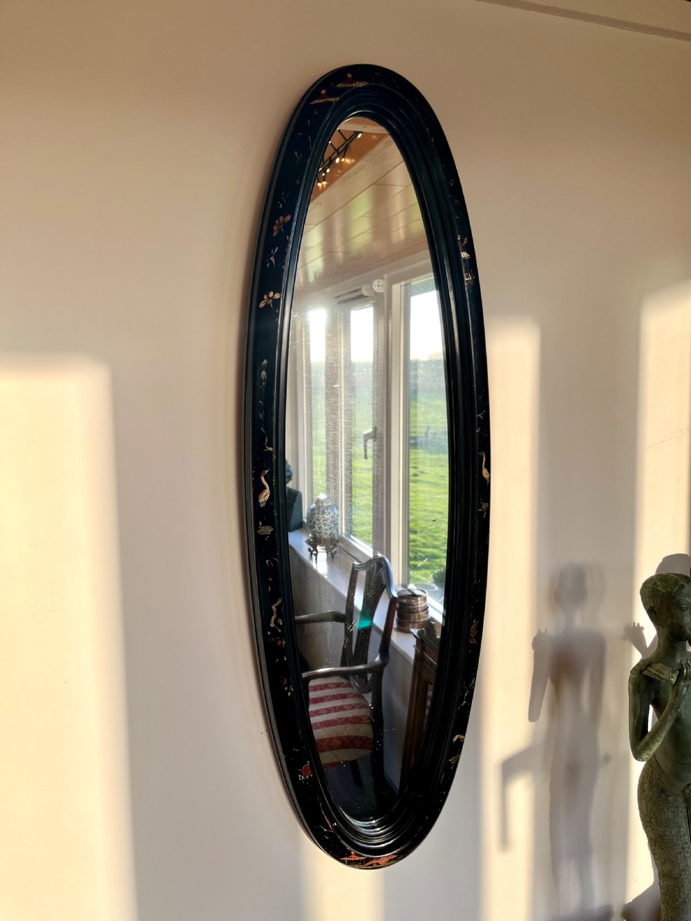 Oval chinoiserie wall mirror 