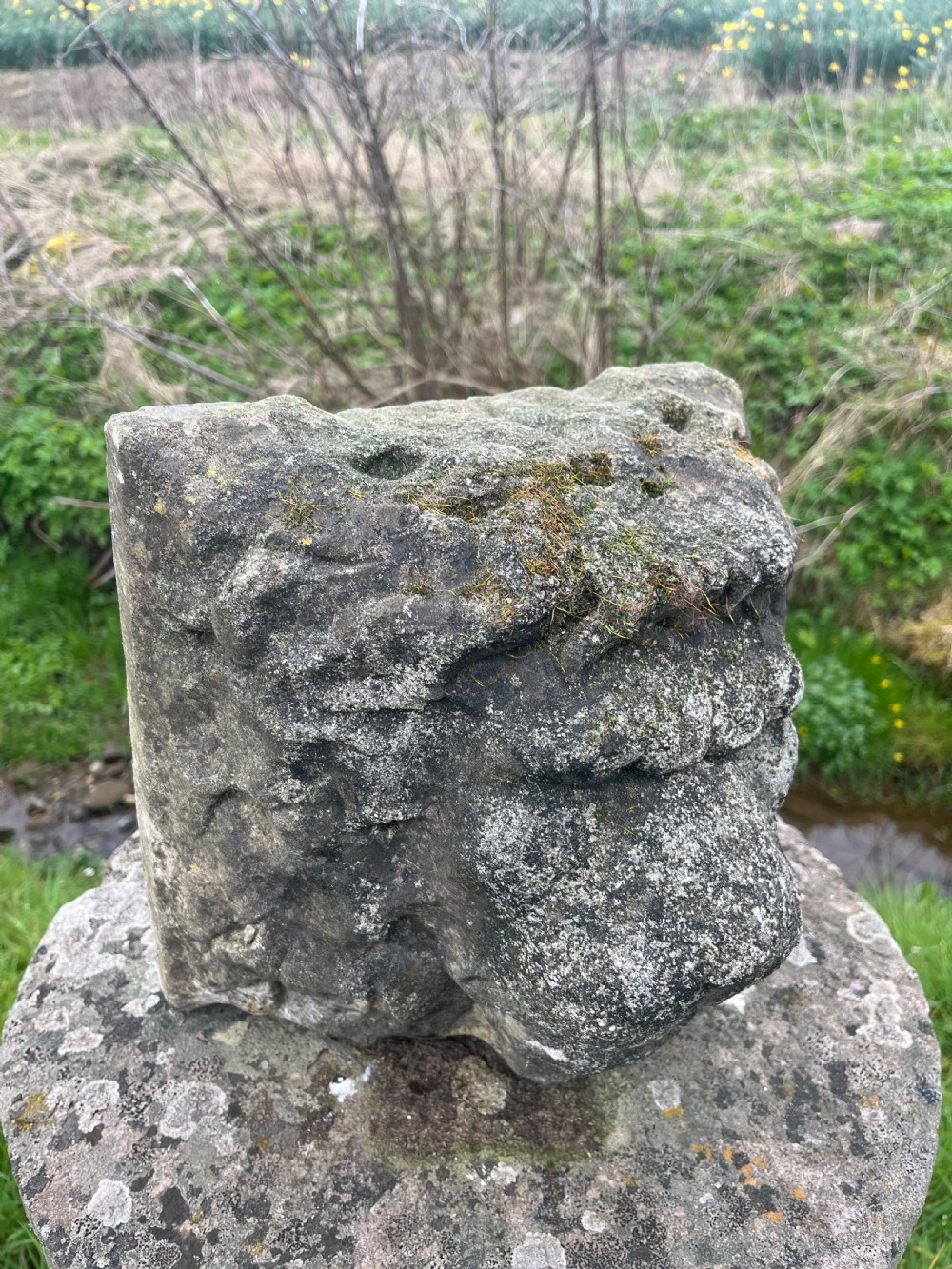 Stone lion mask fountain head View III