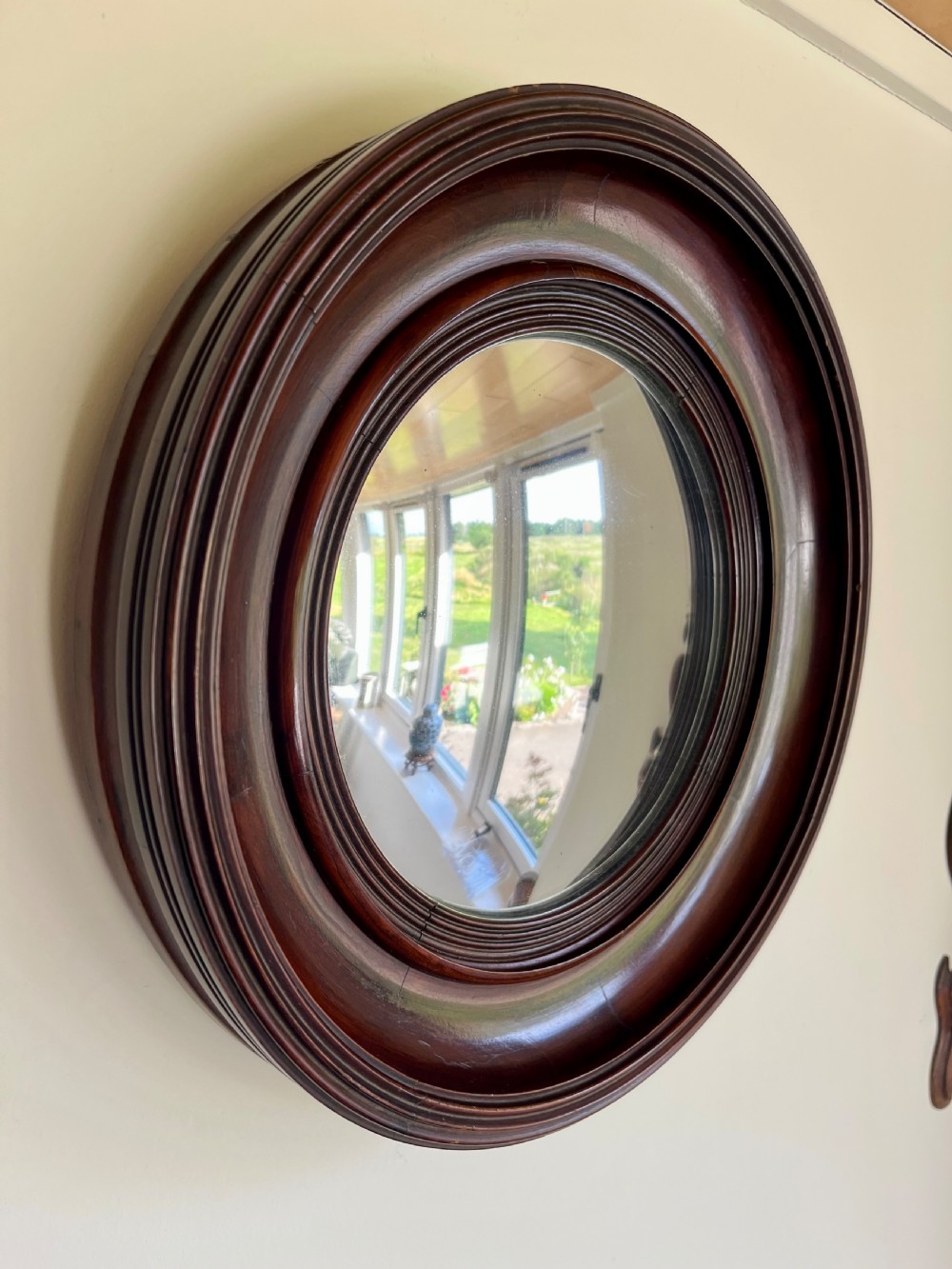 Small mahogany convex mirror 