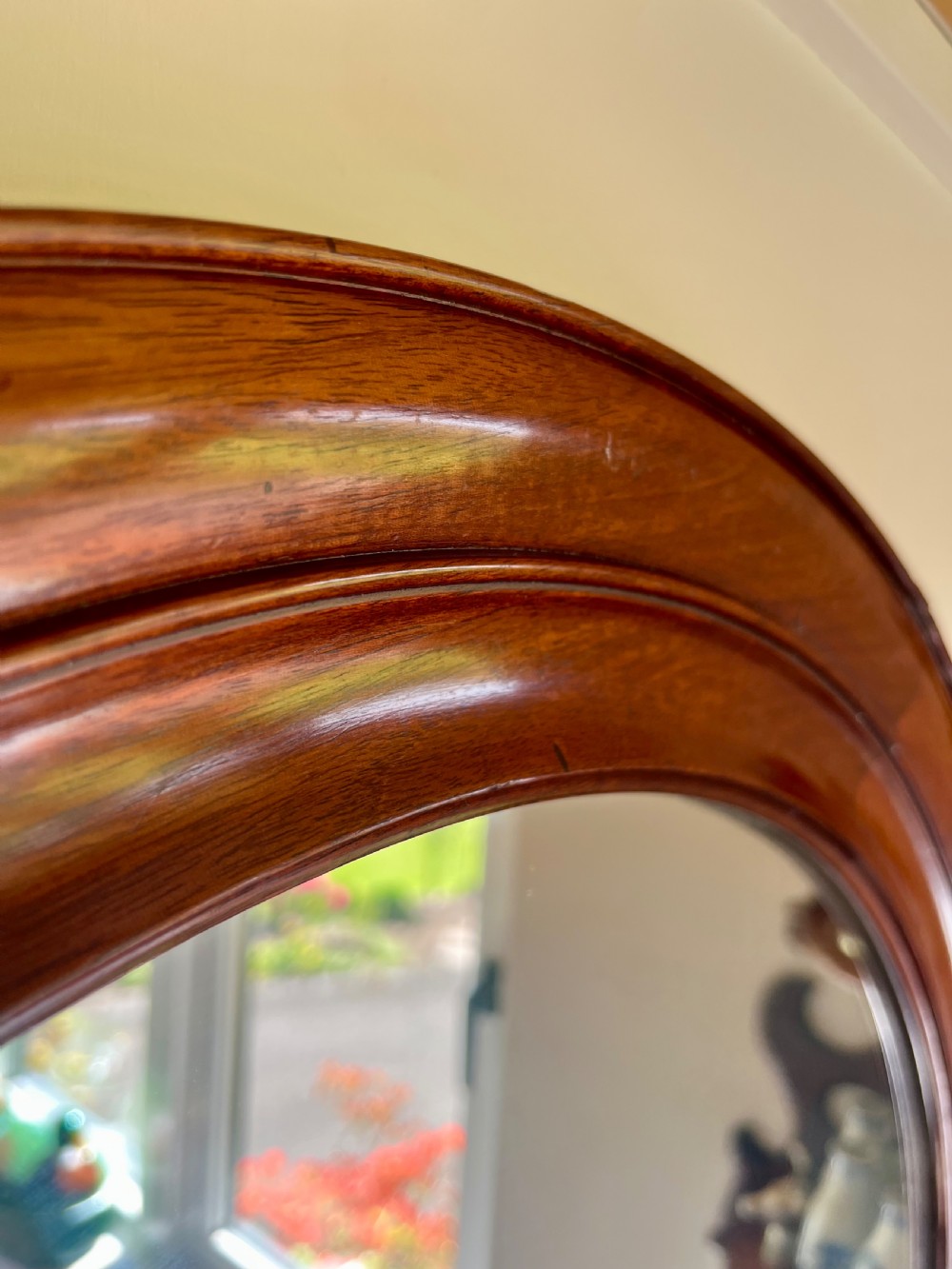 Large circular mahogany wall mirror  View II