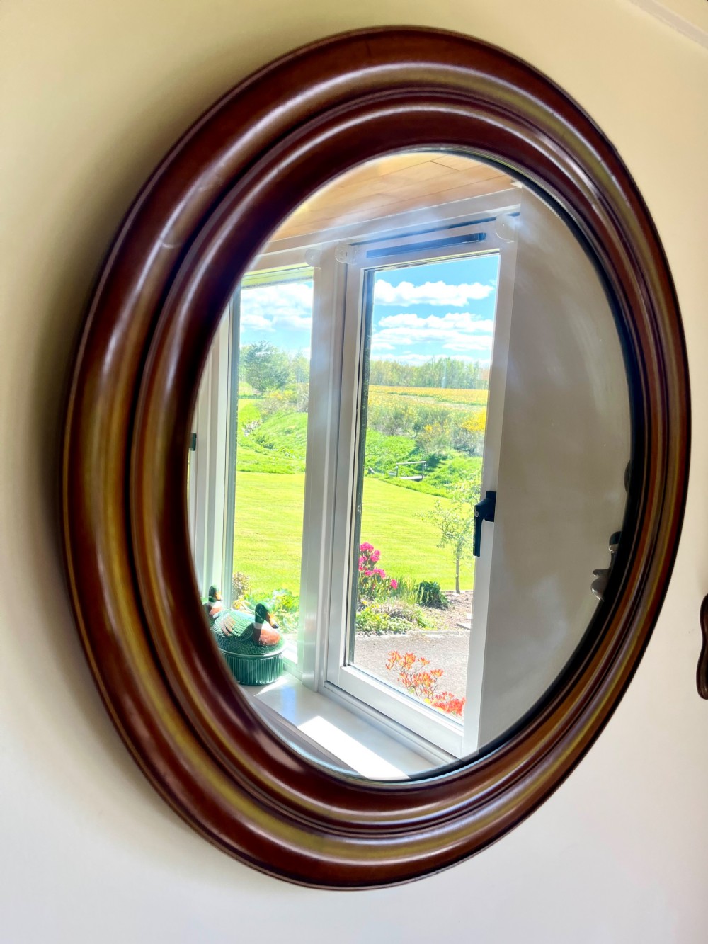 Large circular mahogany wall mirror  View V