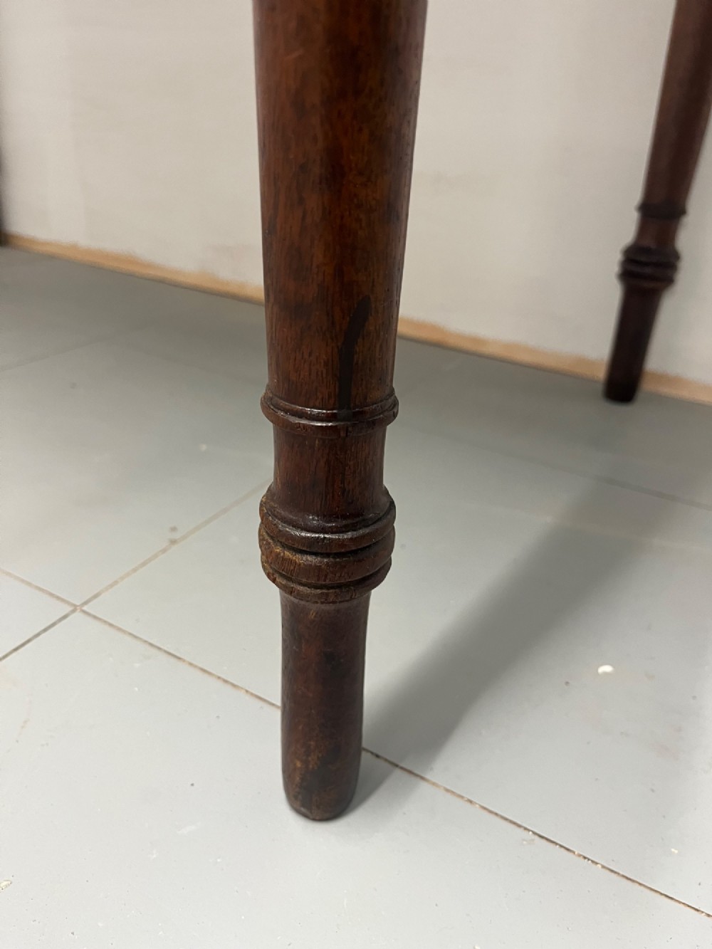 A Scottish Regency mahogany side table featuring two frieze drawers with brass handles and slender turned legs. View VIII