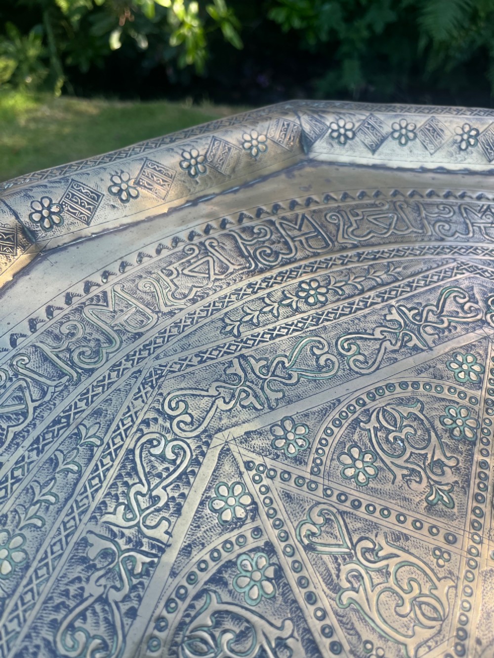 A white painted Moorish style occasional table featuring stepped horseshoe arches and a dark contrasting tray top. View IX