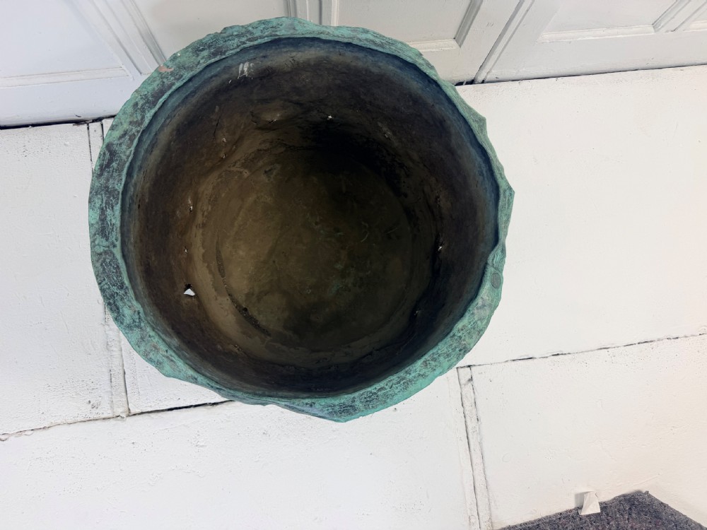 A 19th-century riveted copper garden planter pot featuring a heavily weathered verdigris patina and a perforated lower band. View III