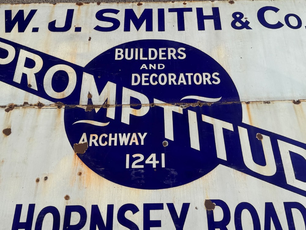A large rectangular white vitreous enamel sign with bold dark blue typography detailing W. J. Smith & Co. Builders and Decorators of Hornsey Road. View II