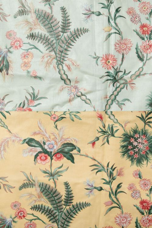 fig 2. A large rectangular fabric wall panel displaying three distinct horizontal bands in mint green, yellow, and blush peach with trailing botanical fern and floral foliage motifs.
