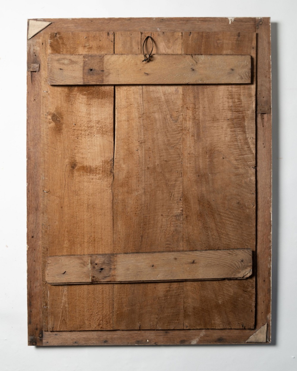 A rectangular off-white painted wood panel featuring an intricate raised relief carving of heraldic cranes, a fruit-filled urn, caduceus serpents, and laurel swags within a moulded frame. View VII