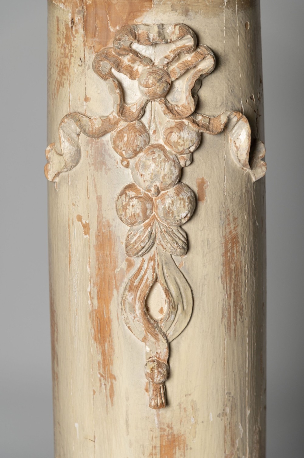 An antique nineteenth-century Swedish painted wooden column featuring a carved ribbon motif and a stepped square plinth base. View II