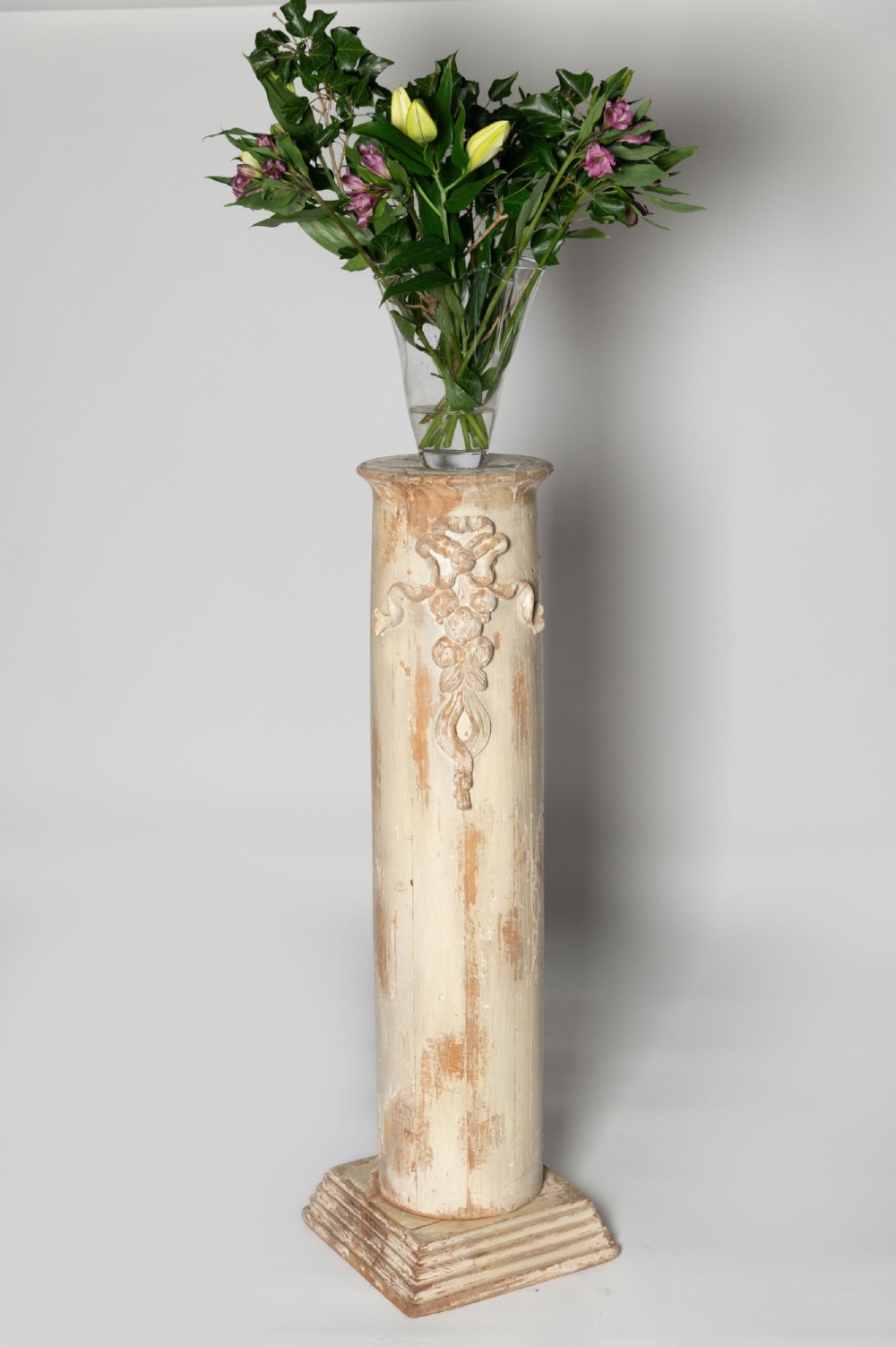 An antique nineteenth-century Swedish painted wooden column featuring a carved ribbon motif and a stepped square plinth base. View V