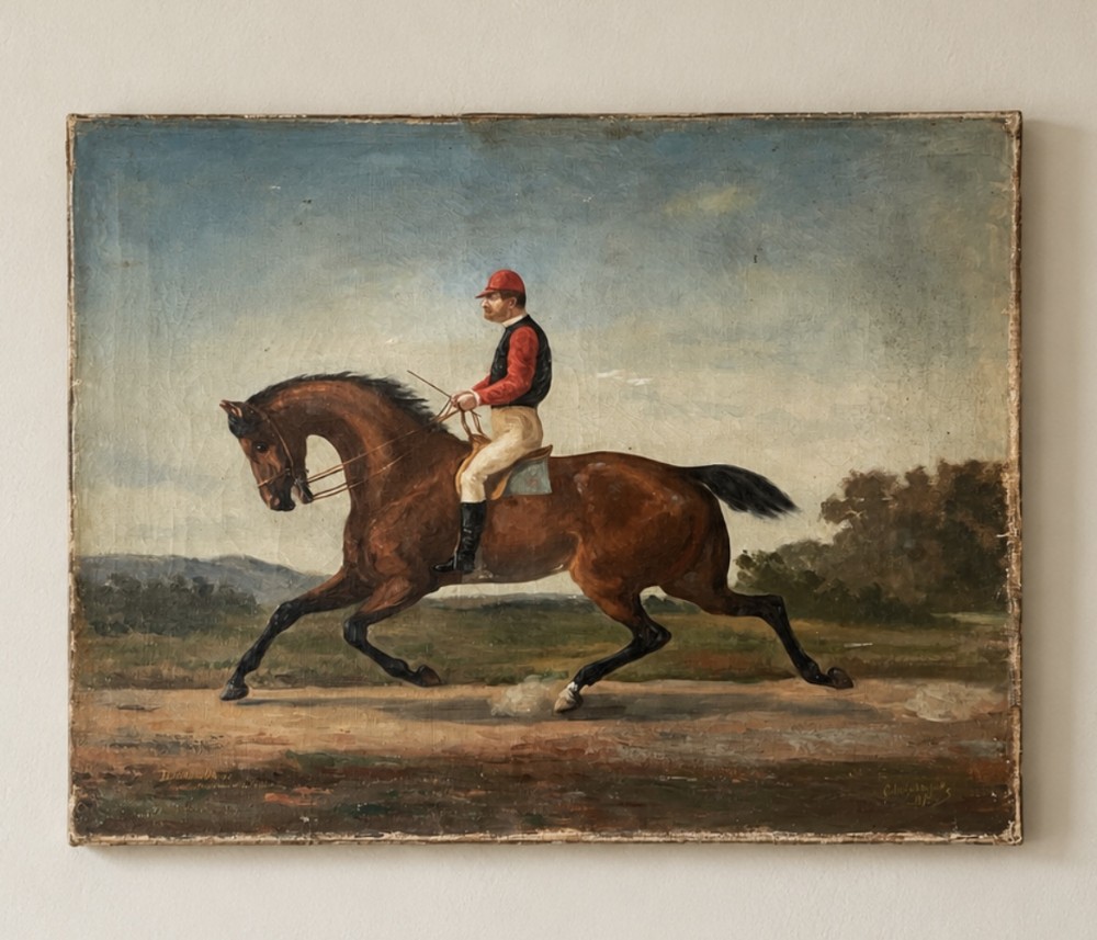 A 19th-century oil painting on canvas depicting a jockey in red and black attire riding a bay horse across a landscape under a blue sky.