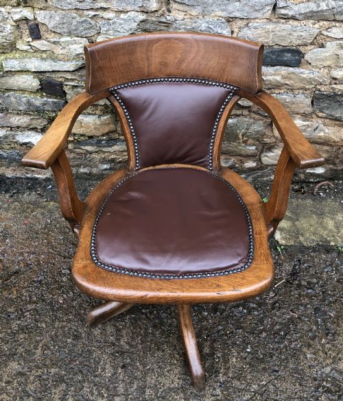 fig 1. Antique Oak Swivel and Tilt Office Desk Chair