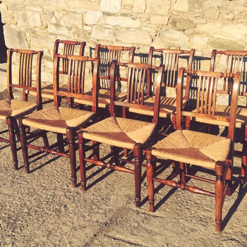 Harlequin Set of 8 Antique Country Dining Chairs with Rush Seats