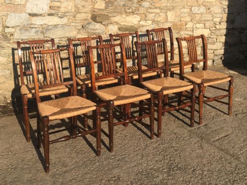 fig 2. Harlequin Set of 8 Antique Country Dining Chairs with Rush Seats