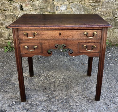 Antique Georgian Mahogany Lowboy with Carved Frieze