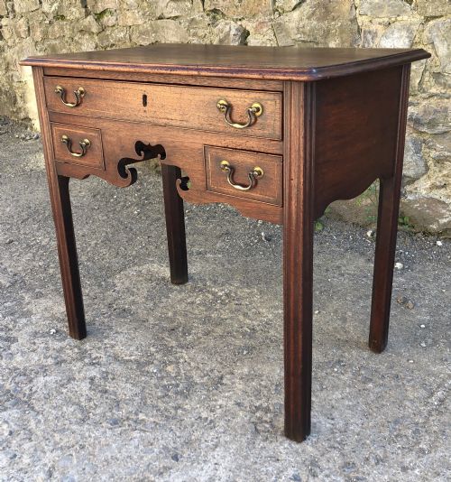 fig 1. Antique Georgian Mahogany Lowboy with Carved Frieze