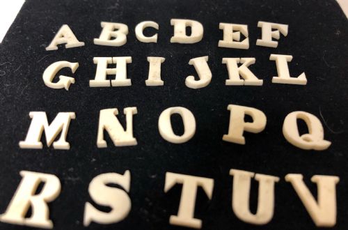 fig 1. Complete Set of Antique Bone Alphabet Spelling Letters