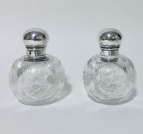 Pair of Antique Cut Glass Scent Bottles with Silver Tops