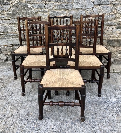 Harlequin Set of 6 Antique Rush Seat Spindle Back Chairs