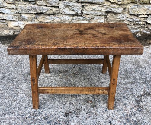 fig 1. Primitive Slab Top Pig Table