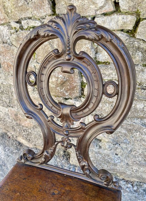 fig 1. Antique Cast Iron Hall Chair