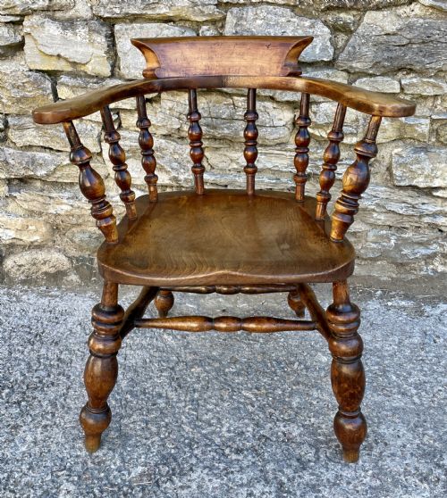 fig 1. Antique Elm Captains Chair