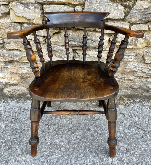 fig 1. Antique Elm Captains Chair