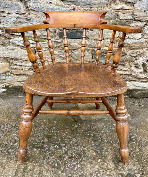 fig 1. Antique Elm Seated Captain’s Chair
