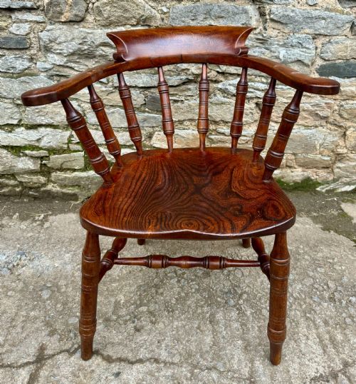 fig 1. Antique Elm Captains Chair