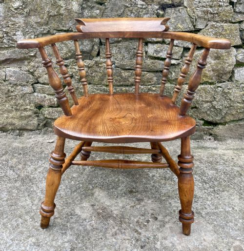 fig 1. Antique Elm Captains Chair