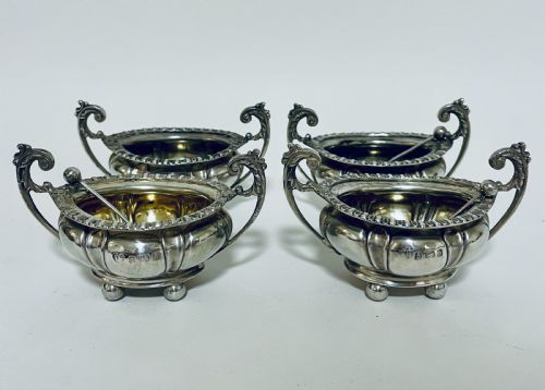 Set of Four Silver Salts and Spoons