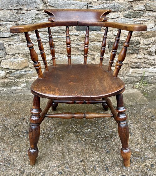 fig 1. Antique Elm Captains Chair