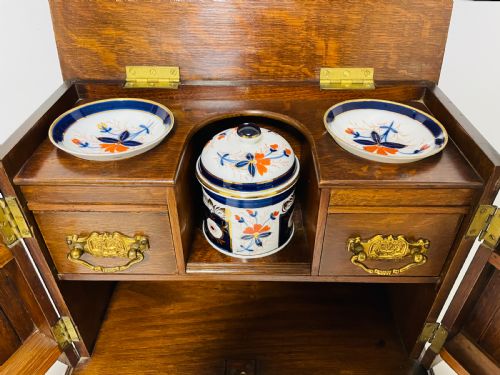 fig 1. Edwardian Oak Smokers Cabinet with Imari Bowls