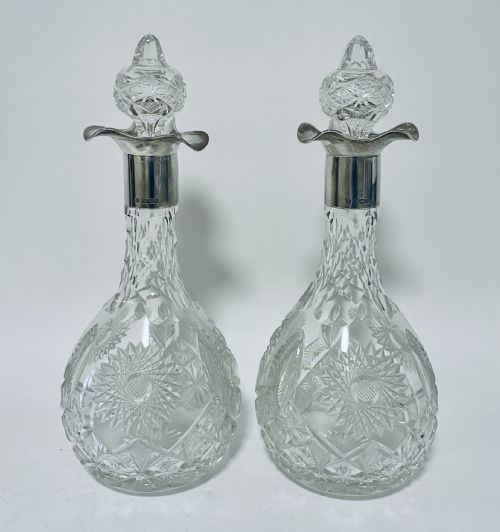 Pair of Silver Mounted Cut Glass Decanters