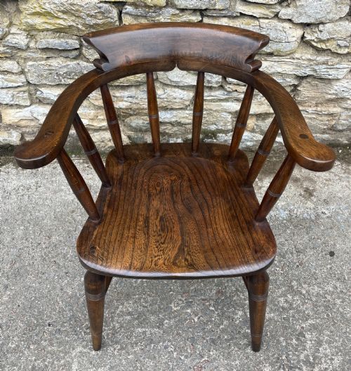 fig 1. Antique Elm Captains Chair