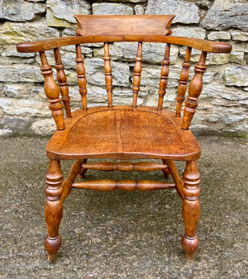 fig 1. Antique Elm Captains Chair