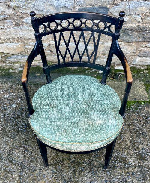 fig 1. Aesthetic Style Ebonised Armchair