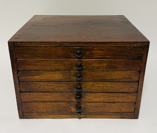 Coin Collector's Cabinet