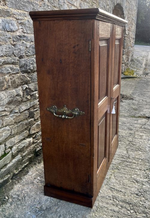 fig 2. Antique Oak Cupboard