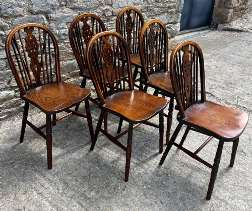 fig 1. Harlequin Set of 6 Antique Wheelback Chairs