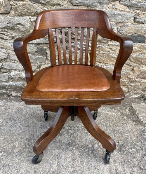 fig 1. Antique Oak Swivel and Tilt Desk Chair