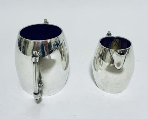 fig 1. Silver Christopher Dresser Style Milk and Sugar