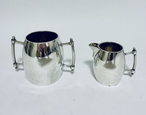 fig 2. Silver Christopher Dresser Style Milk and Sugar
