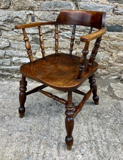 fig 1. Antique Elm Captains Chair
