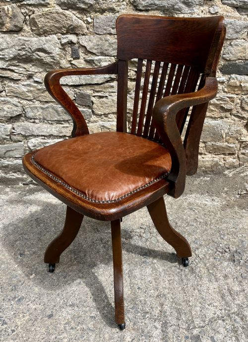 fig 1. Antique Oak Swivel Desk Chair