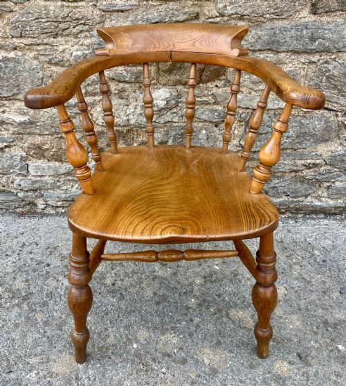 fig 1. Antique Elm Captains Chair