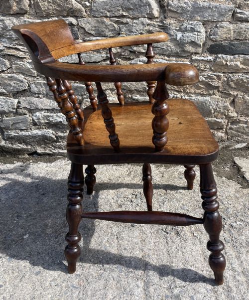fig 1. Antique Elm Captains Chair